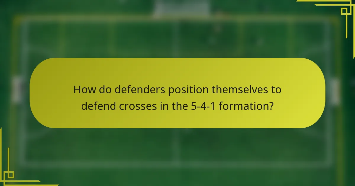 How do defenders position themselves to defend crosses in the 5-4-1 formation?