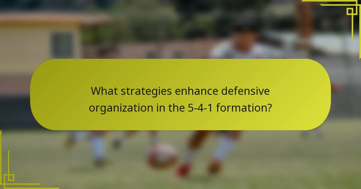 What strategies enhance defensive organization in the 5-4-1 formation?